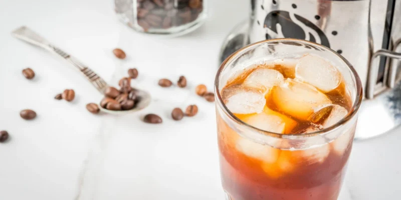 A cold brew coffee in a glass with ice